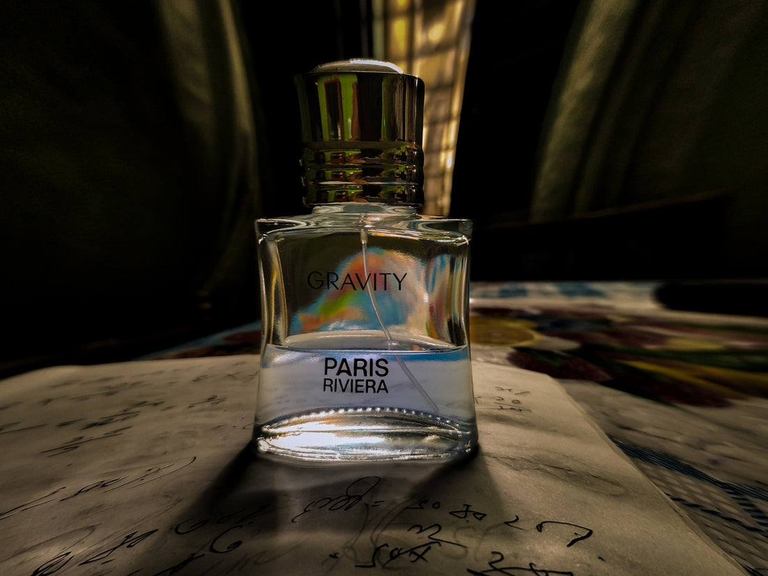 a bottle of perfume sitting on top of a table