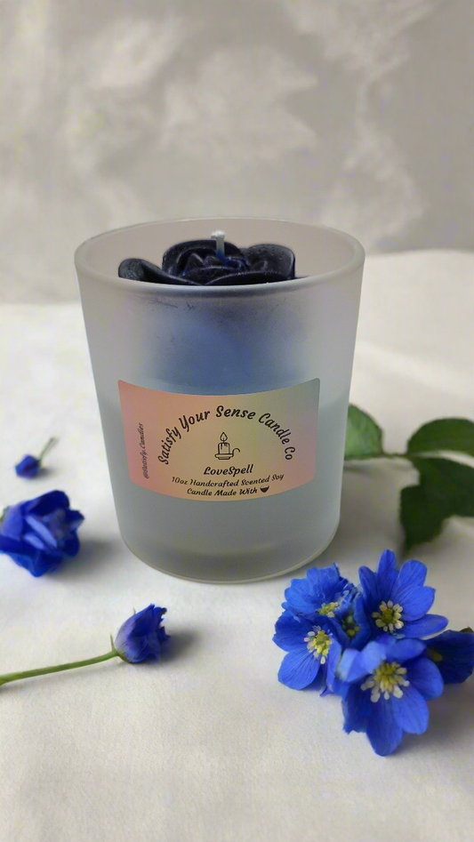 Fall under the spell of sweet seduction. Our Love Spell candle blends juicy peach, cherry blossom, and a touch of white jasmine to create a scent that’s soft, romantic, and irresistible. It’s the perfect vibe for self-love rituals, date nights, or simply feeling beautiful in your own skin.  Crafted with 100% soy wax and premium fragrance oils for a clean, long-lasting burn.