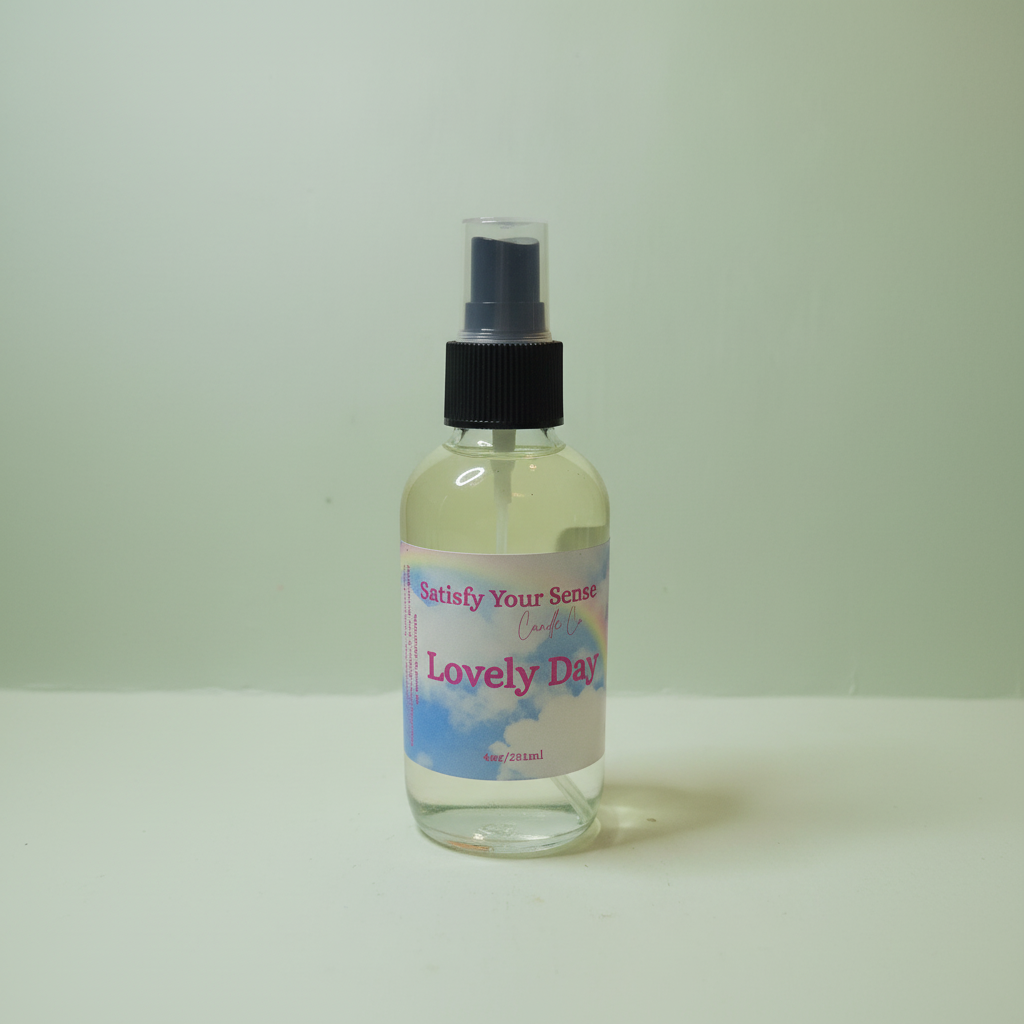 Lovely Day aroma room spray in a clear bottle with a black spray top.