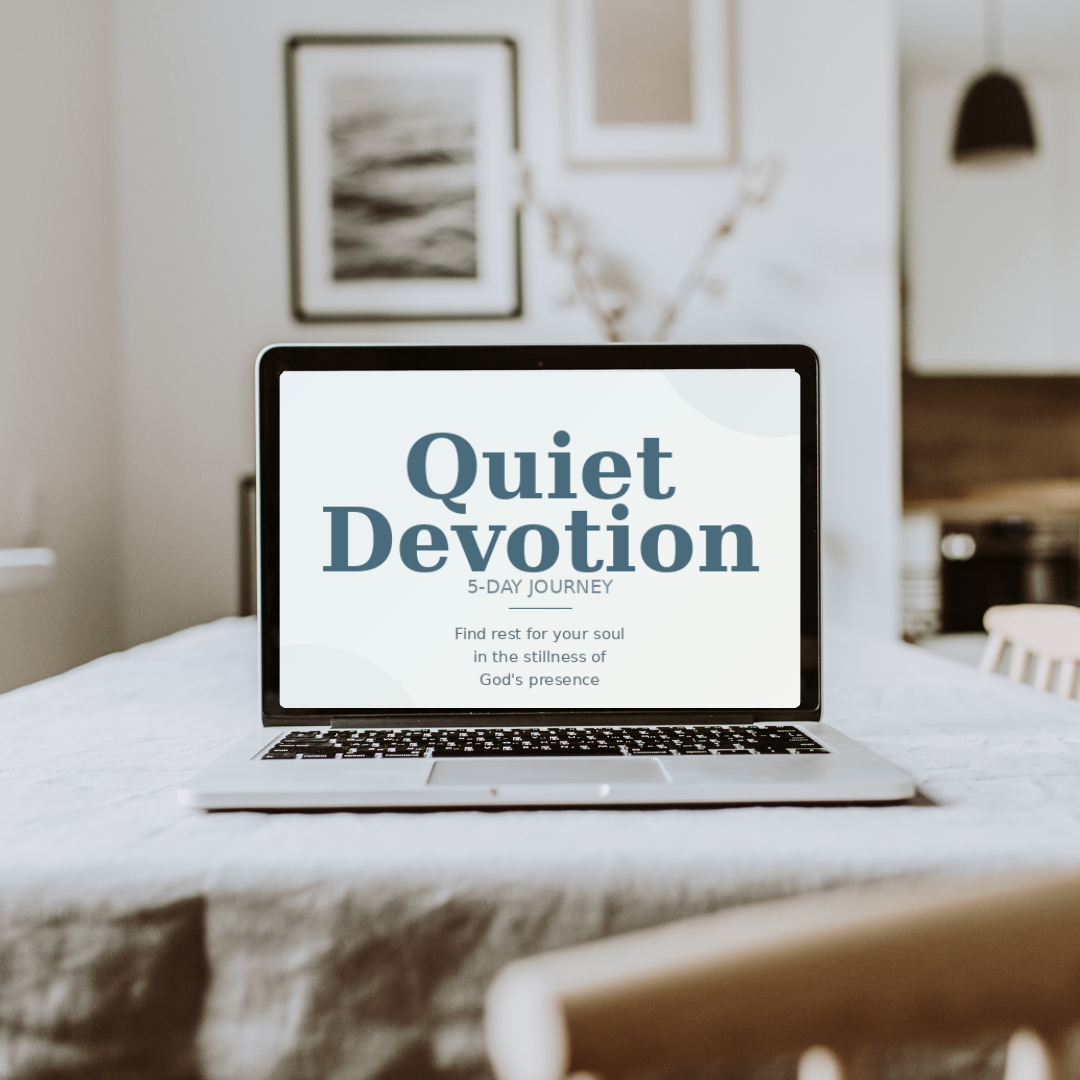 A laptop on a table displays the Quiet Devotion 5-day journey digital devotional.